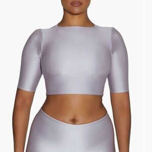 NWT Naked Wardrobe “The Sleek T Top”